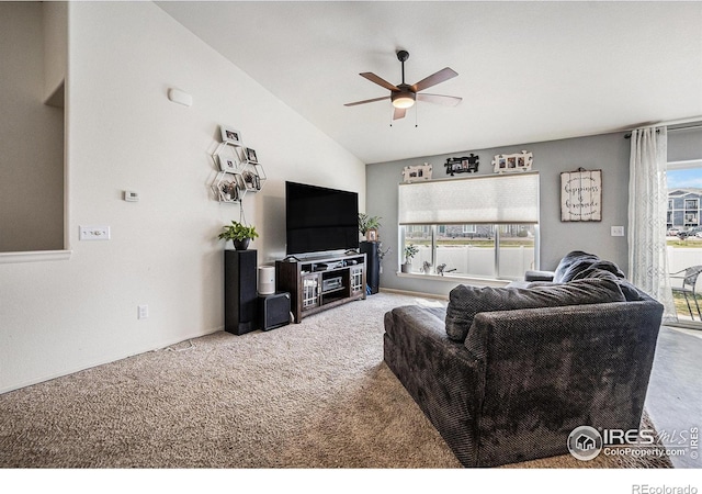 carpeted living room featuring lofted ceiling and ceiling fan