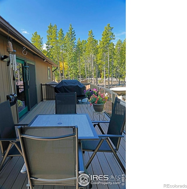 10649 Christopher Dr, Conifer, CO 80433 - deck featuring outdoor dining space