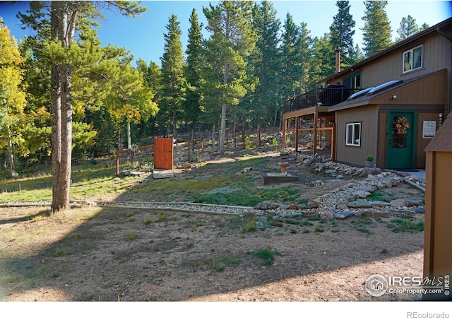 10649 Christopher Dr, Conifer, CO 80433 - view of yard featuring fence and a wooden deck