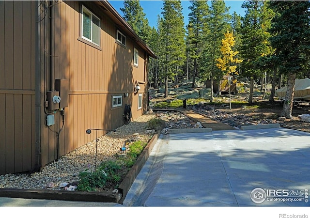 10649 Christopher Dr, Conifer, CO 80433 - view of side of home with a patio area