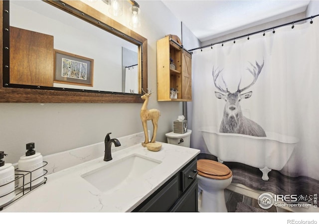 10649 Christopher Dr, Conifer, CO 80433 - bathroom featuring toilet and vanity