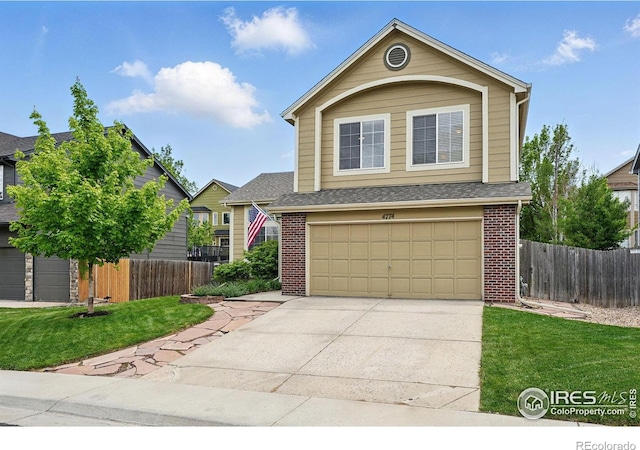 4774 Coker Ave, Castle Rock, CO 80104 - traditional-style house with brick siding, driveway, an attached garage, and roof with shingles