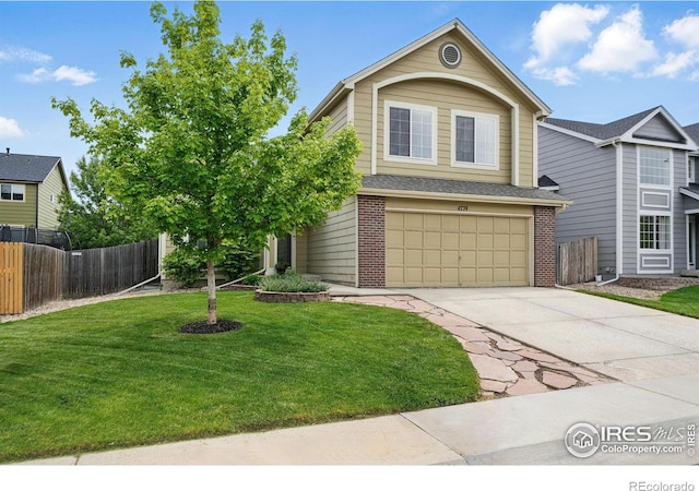 4774 Coker Ave, Castle Rock, CO 80104 - view of front of property with concrete driveway, brick siding, and a garage