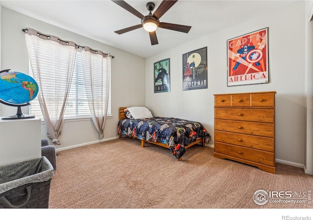4774 Coker Ave, Castle Rock, CO 80104 - carpeted bedroom with baseboards and a ceiling fan
