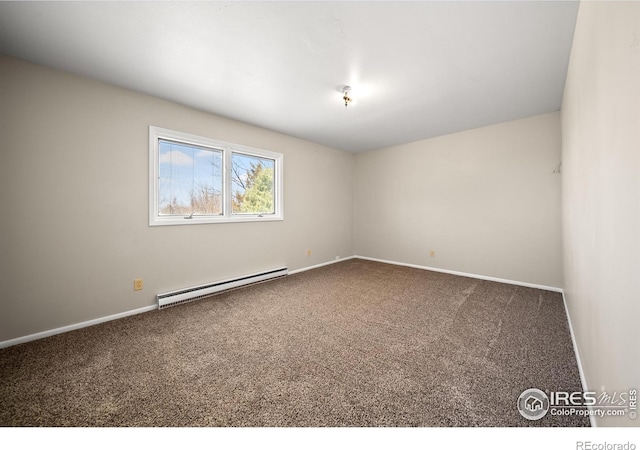 17492 County Road 29, Brush, CO 80723 - unfurnished room with a baseboard heating unit, carpet floors, and baseboards