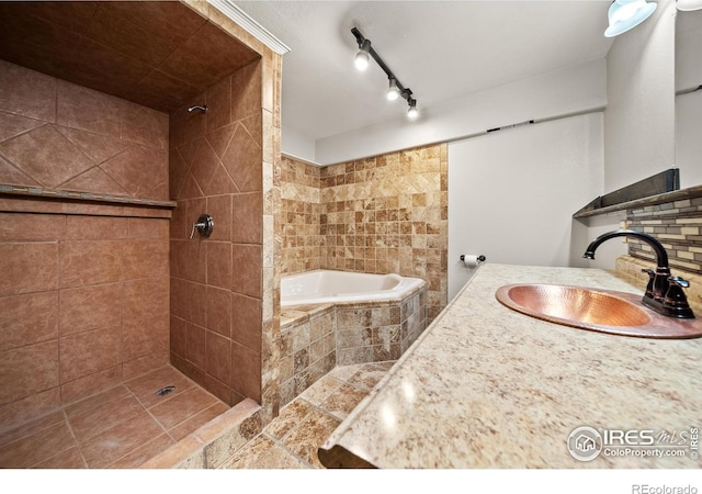 17492 County Road 29, Brush, CO 80723 - full bath with tiled bath, vanity, and a tile shower