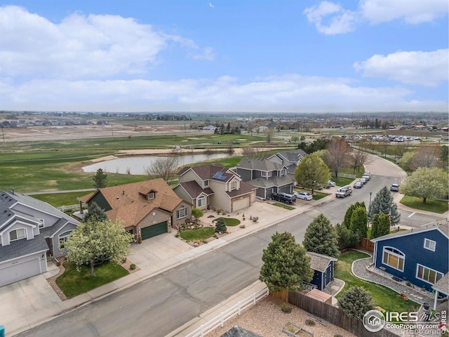 2190 Coyote Creek Dr, Fort Lupton, CO 80621 - aerial perspective of suburban area with a nearby body of water