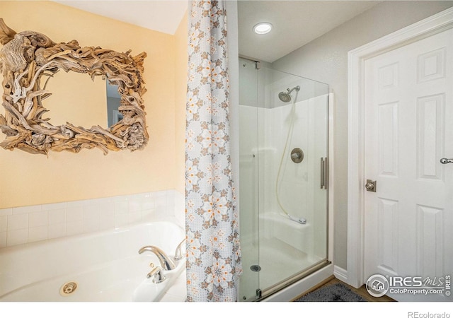 2190 Coyote Creek Dr, Fort Lupton, CO 80621 - full bath featuring a shower stall and a bath