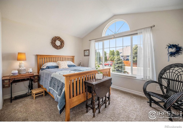 2190 Coyote Creek Dr, Fort Lupton, CO 80621 - carpeted bedroom with vaulted ceiling and baseboards