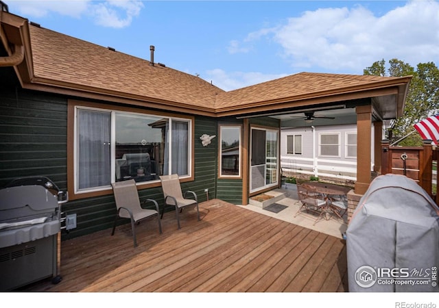 2190 Coyote Creek Dr, Fort Lupton, CO 80621 - deck with a ceiling fan, grilling area, and outdoor dining area