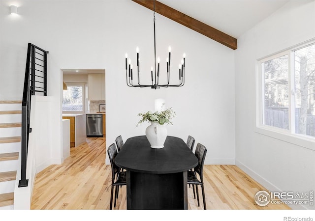 1012 Hobson Ct, Fort Collins, CO 80526 - dining space with light wood-type flooring, a chandelier, stairs, and baseboards