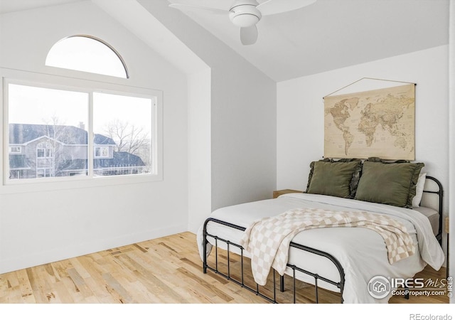 1012 Hobson Ct, Fort Collins, CO 80526 - bedroom with lofted ceiling, wood finished floors, and ceiling fan
