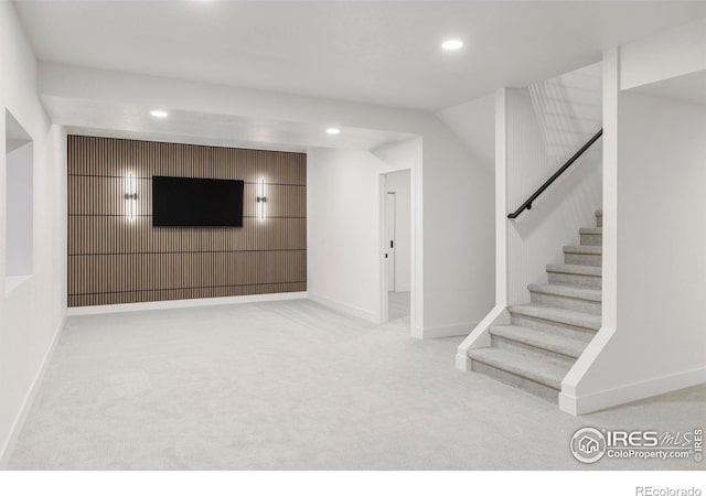1012 Hobson Ct, Fort Collins, CO 80526 - below grade area featuring carpet flooring, recessed lighting, stairway, and baseboards