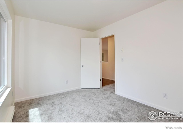 3465 Lochwood Dr Unit G-32, Fort Collins, CO 80525 - unfurnished room featuring baseboards and carpet floors