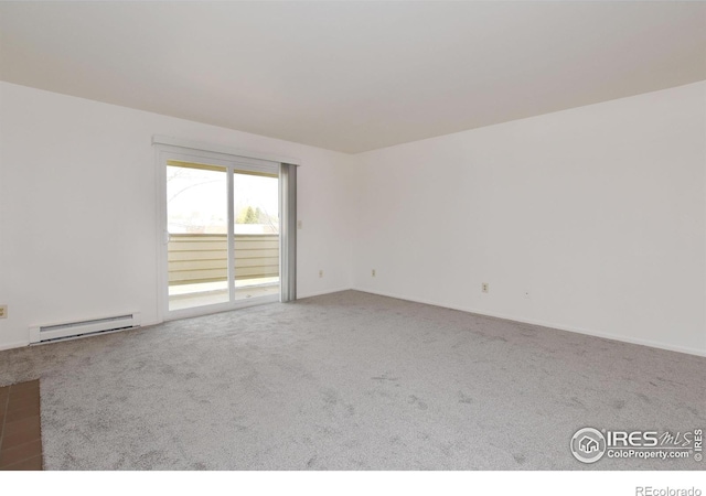 3465 Lochwood Dr Unit G-32, Fort Collins, CO 80525 - empty room with carpet and a baseboard radiator