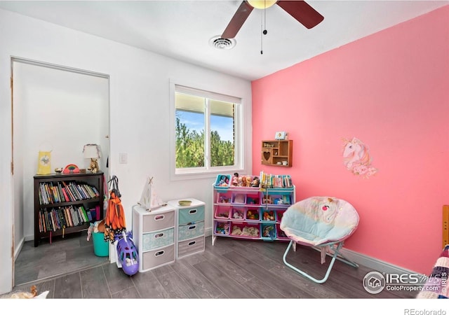 7859 Whitetail Cir, Wellington, CO 80549 - recreation room featuring wood finished floors, a ceiling fan, and baseboards