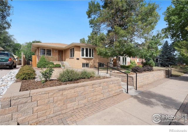 view of front of home featuring a gate and fence