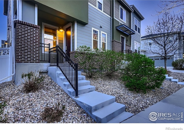 8482 Parkland St, Broomfield, CO 80021 - entrance to property featuring brick siding