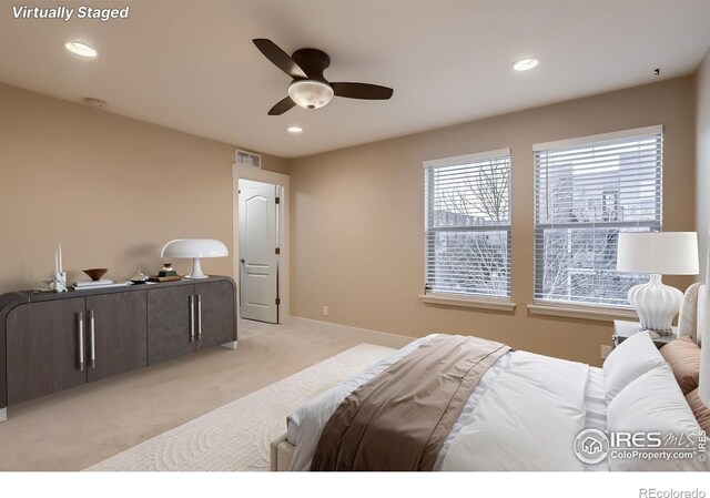 8482 Parkland St, Broomfield, CO 80021 - bedroom with light colored carpet, recessed lighting, a ceiling fan, and baseboards