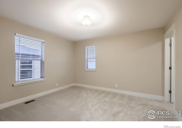 8482 Parkland St, Broomfield, CO 80021 - spare room with light colored carpet and baseboards