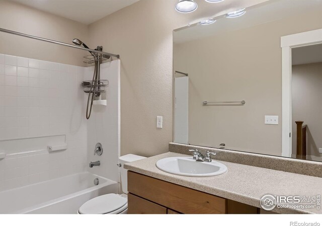 8482 Parkland St, Broomfield, CO 80021 - bathroom with toilet, vanity, and shower / washtub combination