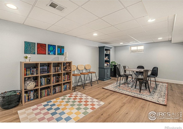 2566 S Stuart St, Denver, CO 80219 - dining space with wood finished floors, a drop ceiling, baseboards, and recessed lighting