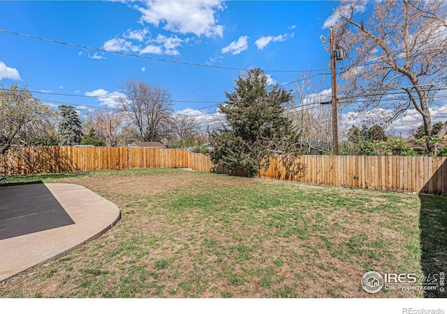2566 S Stuart St, Denver, CO 80219 - view of yard featuring a patio