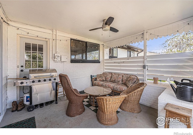 2566 S Stuart St, Denver, CO 80219 - view of patio / terrace featuring ceiling fan, area for grilling, and an outdoor living space