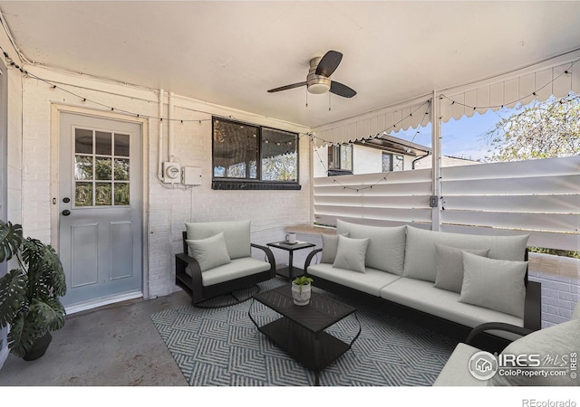 2566 S Stuart St, Denver, CO 80219 - view of patio / terrace with an outdoor living space and ceiling fan
