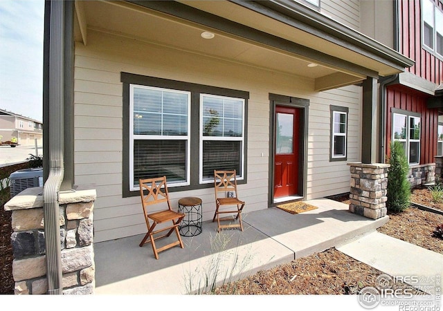 1693 Grand Ave Unit 1, Windsor, CO 80550 - doorway to property featuring a porch