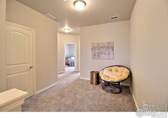 1693 Grand Ave Unit 1, Windsor, CO 80550 - living area featuring carpet and baseboards
