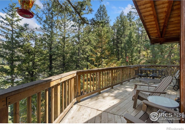 741 Hickory Dr, Lyons, CO 80540 - deck featuring outdoor dining area