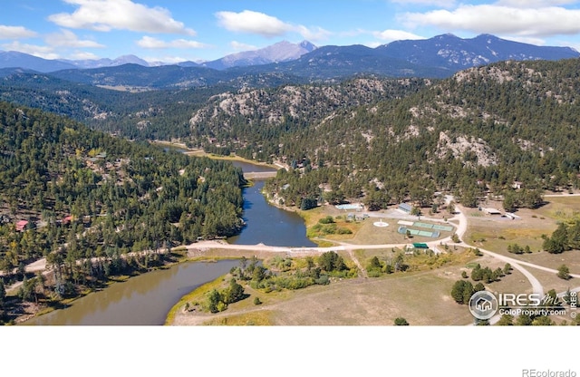 741 Hickory Dr, Lyons, CO 80540 - drone / aerial view with a forest view and a water and mountain view