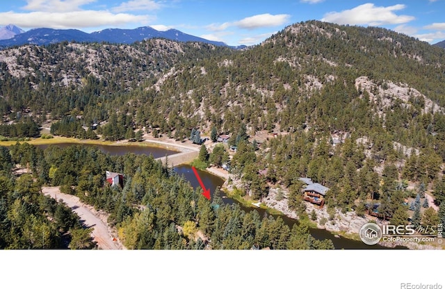 741 Hickory Dr, Lyons, CO 80540 - drone / aerial view with a water and mountain view and a forest view