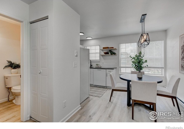3200 Azalea Dr Unit 5, Fort Collins, CO 80526 - dining space featuring light wood-style floors and baseboards