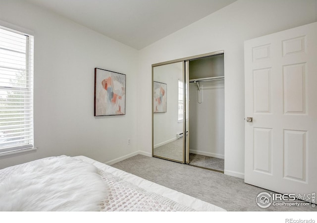 3200 Azalea Dr Unit 5, Fort Collins, CO 80526 - bedroom featuring carpet flooring, multiple windows, baseboards, and lofted ceiling
