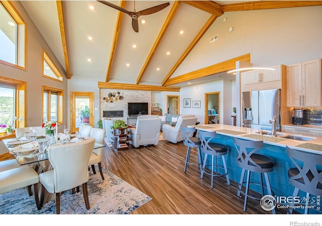 91 Eagle Rising Pl, Livermore, CO 80536 - dining space featuring high vaulted ceiling, beam ceiling, dark wood-style floors, a ceiling fan, and recessed lighting