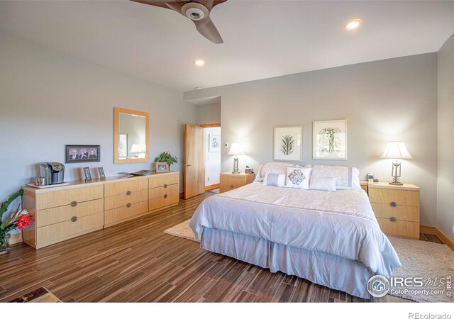 91 Eagle Rising Pl, Livermore, CO 80536 - bedroom with dark wood-style flooring, recessed lighting, a ceiling fan, and baseboards