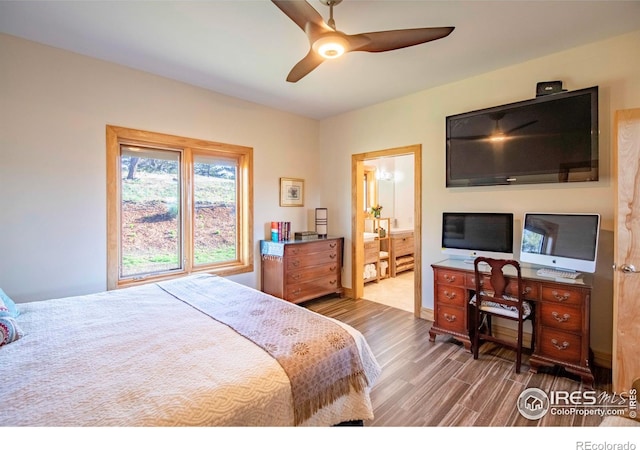 91 Eagle Rising Pl, Livermore, CO 80536 - bedroom with wood finished floors, ceiling fan, and ensuite bathroom