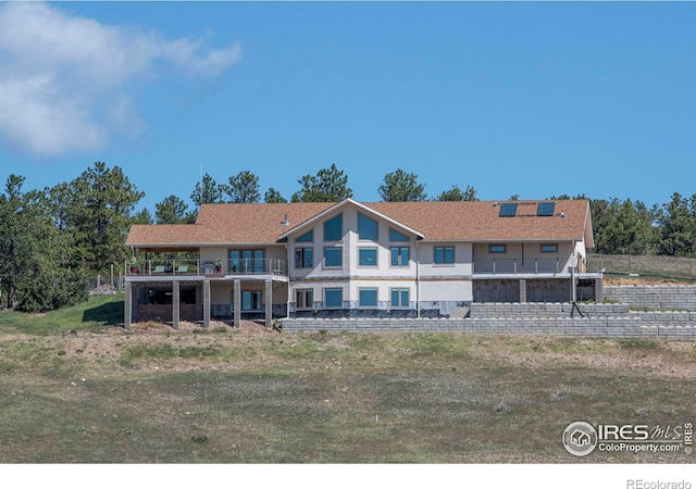 91 Eagle Rising Pl, Livermore, CO 80536 - rear view of house featuring a balcony