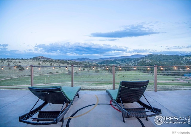 91 Eagle Rising Pl, Livermore, CO 80536 - view of patio featuring a mountain view