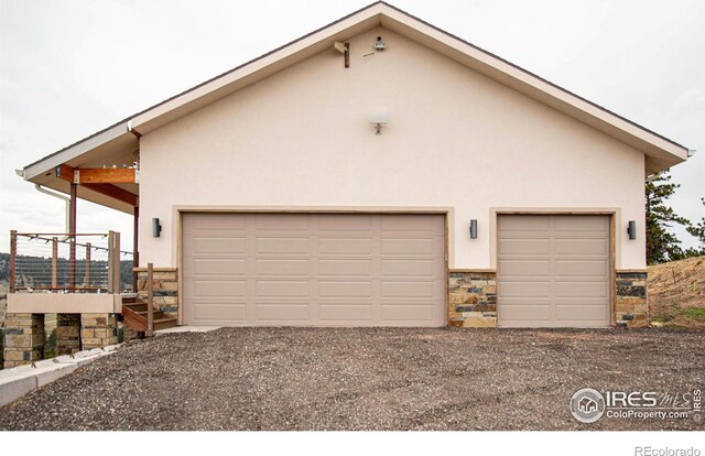 91 Eagle Rising Pl, Livermore, CO 80536 - garage featuring driveway
