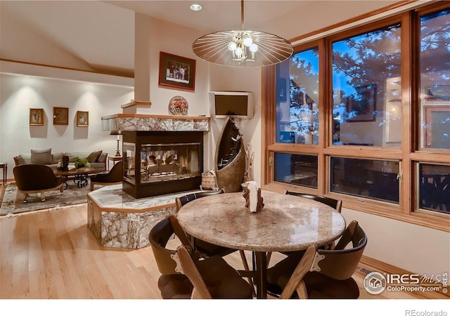 36 High View Dr, Boulder, CO 80304 - dining area with a multi sided fireplace, wood finished floors, and recessed lighting