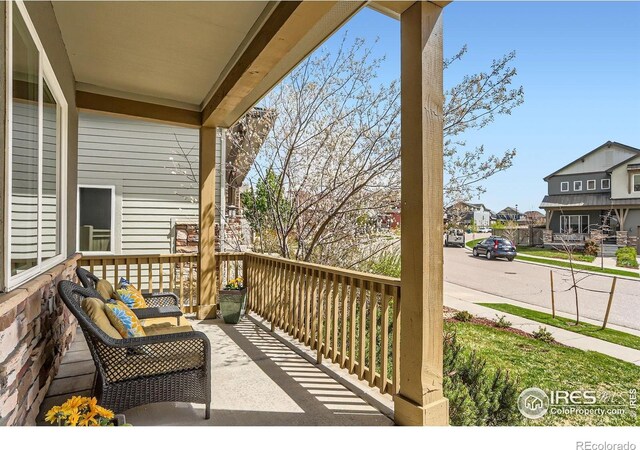 balcony with a porch and a residential view