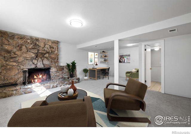 910 Sparta Dr, Lafayette, CO 80026 - carpeted living area with a fireplace and visible vents