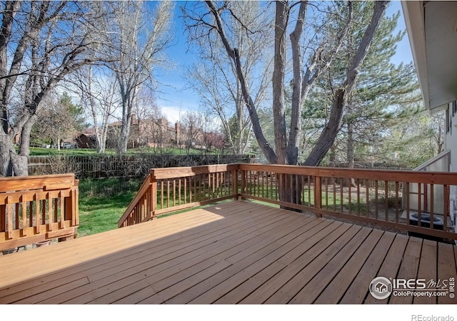 910 Sparta Dr, Lafayette, CO 80026 - wooden deck featuring a fenced backyard