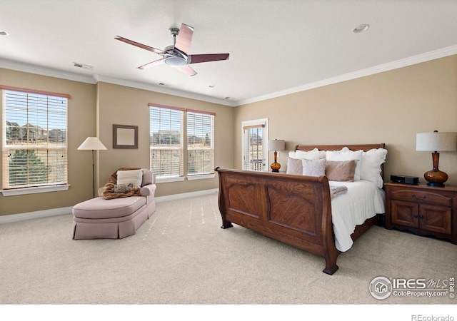 bedroom featuring light carpet, baseboards, and crown molding