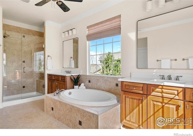 full bath with a garden tub, a stall shower, ornamental molding, and a sink