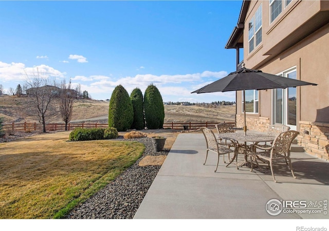 view of patio / terrace with fence and outdoor dining space