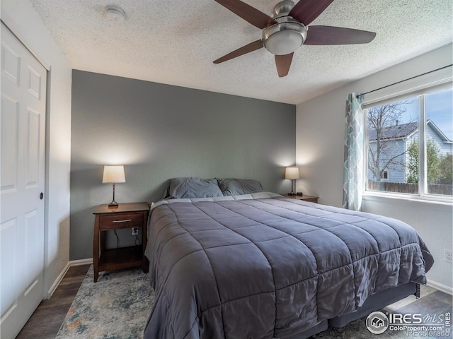 13146 Raritan Ct, Westminster, CO 80234 - bedroom featuring a textured ceiling, ceiling fan, and baseboards